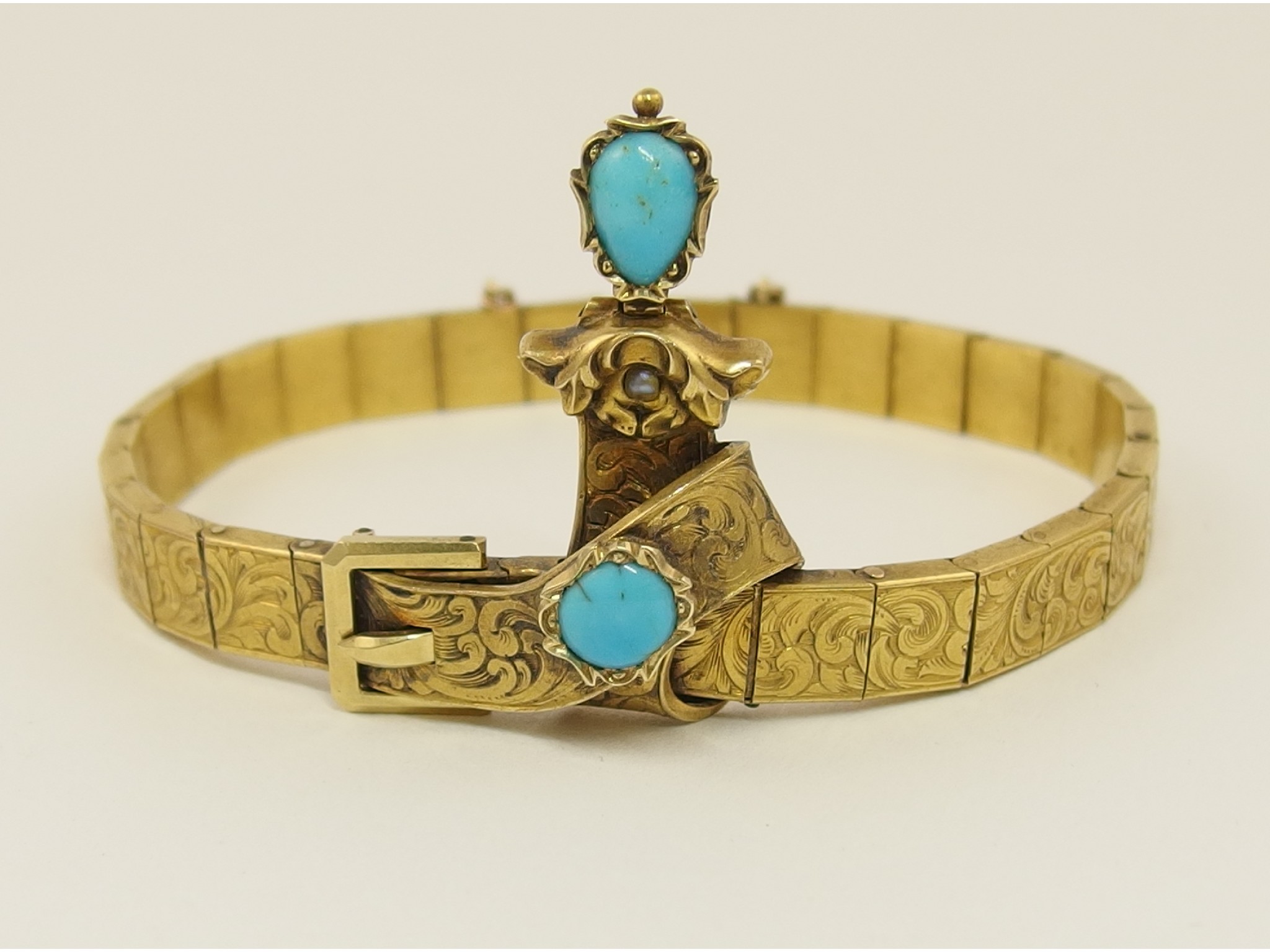 Appraisal: A Victorian braceletdesigned as a buckled belt set with turquoises