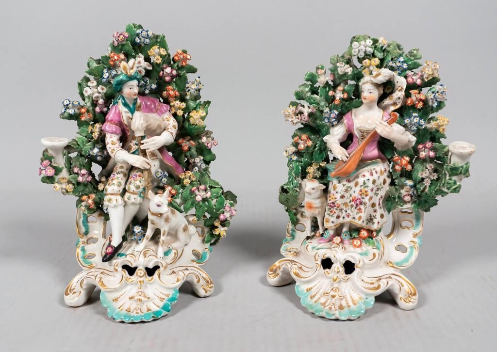 Appraisal: Pair of Chelsea style bocage porcelain figures musicians Each H