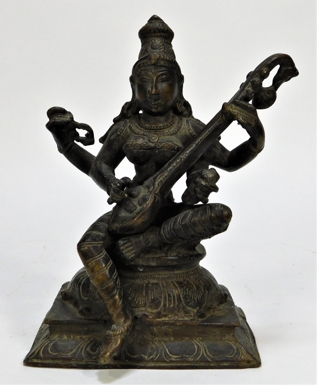 Appraisal: ANTIQUE INDIAN BRONZE FIGURE OF SEATED SARASWATI India th- th