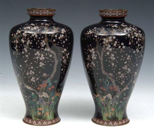 Appraisal: A PAIR OF JAPANESE BLACK GROUND CLOISONNE TAPERING VASES with