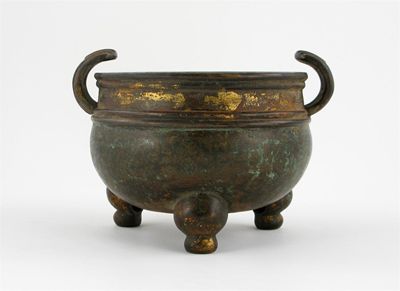 Appraisal: A Chinese bronze censer with incurved handles raised on three