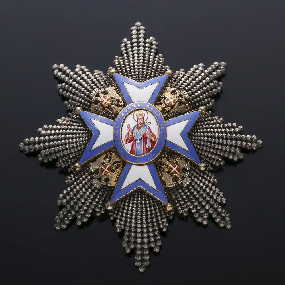 Appraisal: A SERBIAN ORDER OF ST SAVA ENAMELED BADGE An award