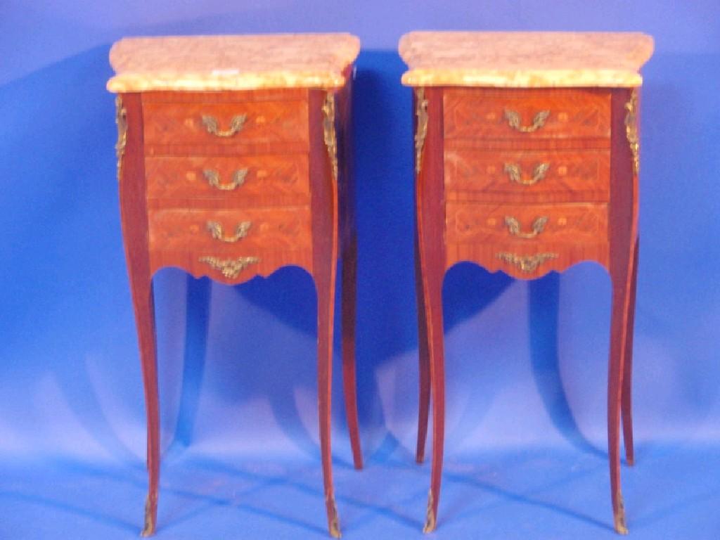 Appraisal: A pair of Continental mahogany marquetry inlaid bedside cabinets with