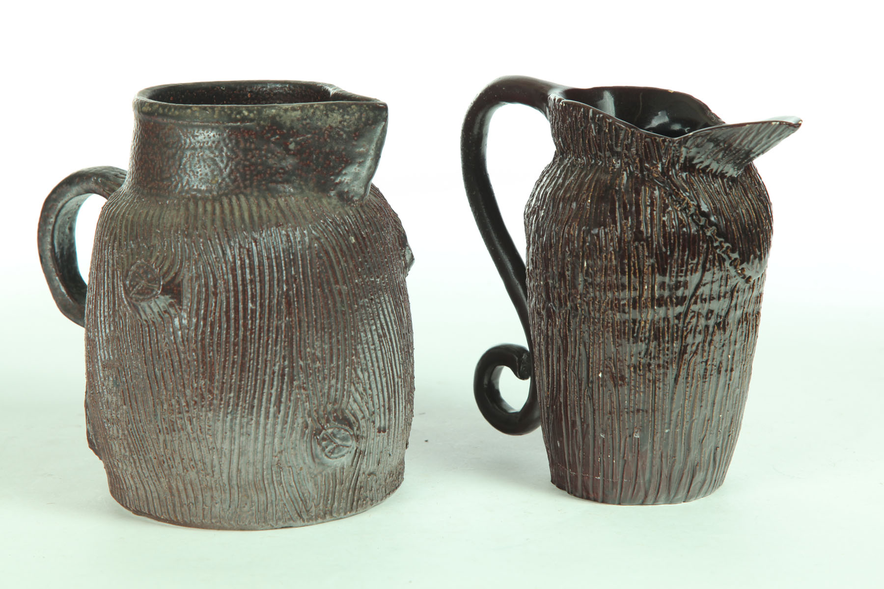 Appraisal: TWO SEWERTILE PITCHERS American early th century Both in the