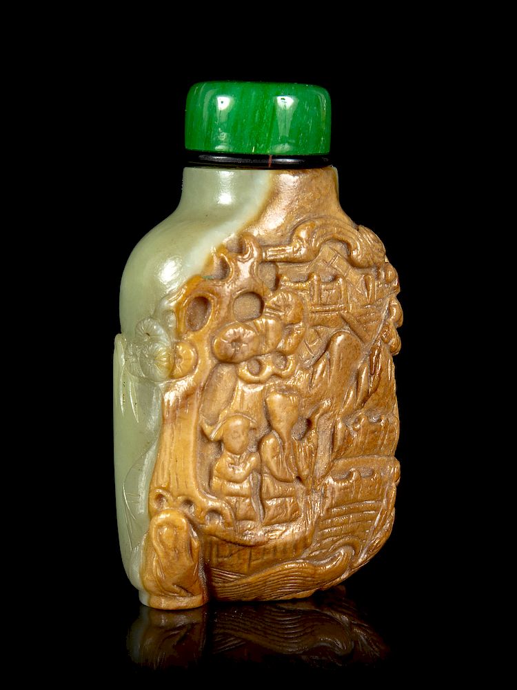 Appraisal: A Carved Russet and Celadon Jade Snuff Bottle Height in