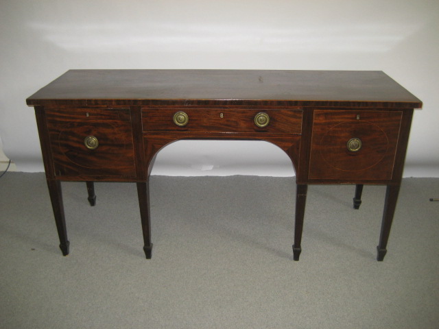 Appraisal: A GEORGE III MAHOGANY SIDEBOARD c of straight fronted form