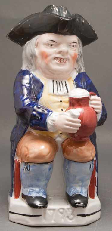 Appraisal: Staffordshire painted traditional toby jug mid th century lidded toby