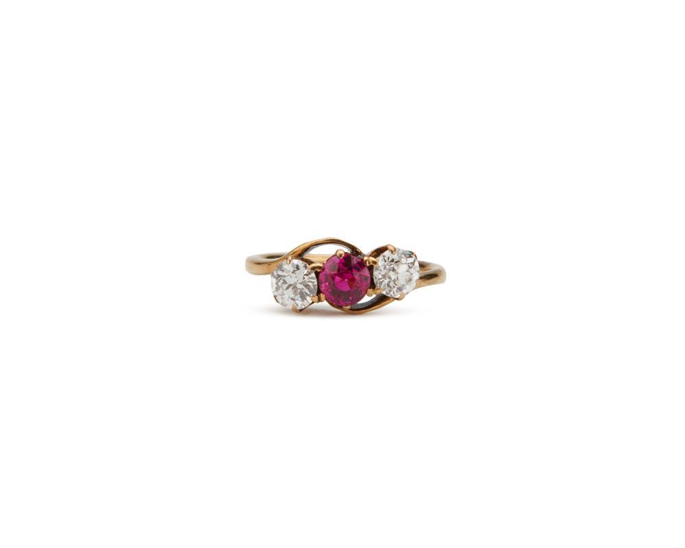 Appraisal: K Gold Ruby and Diamond Ring centering a circle-cut ruby