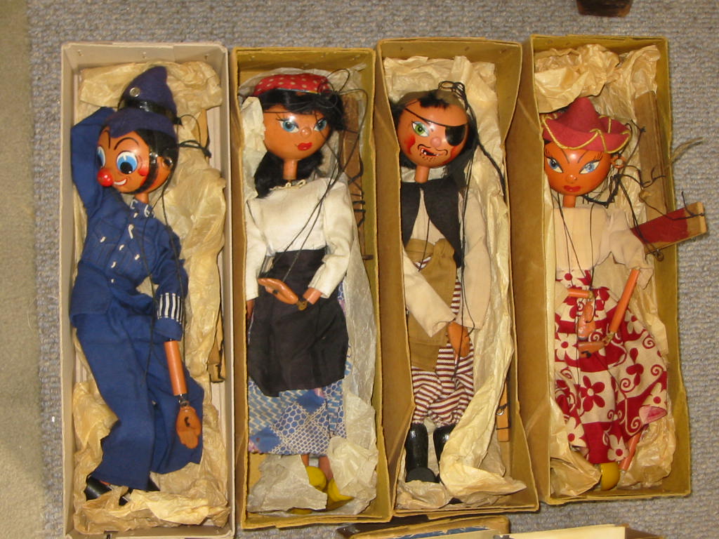 Appraisal: Four Pelham puppets LS Mexican Girl with lead hands and