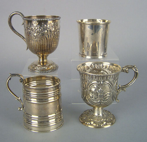 Appraisal: Four Philadelphia coin silver mugs th c bearing the touches