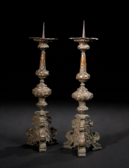 Appraisal: Unusual Pair of Continental Patinated and Embossed Copper Tripodal Pricket