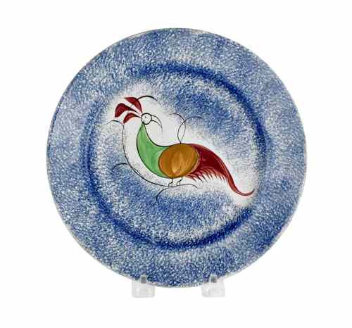 Appraisal: Blue spatter plate with a peafowl th c dia Provenance