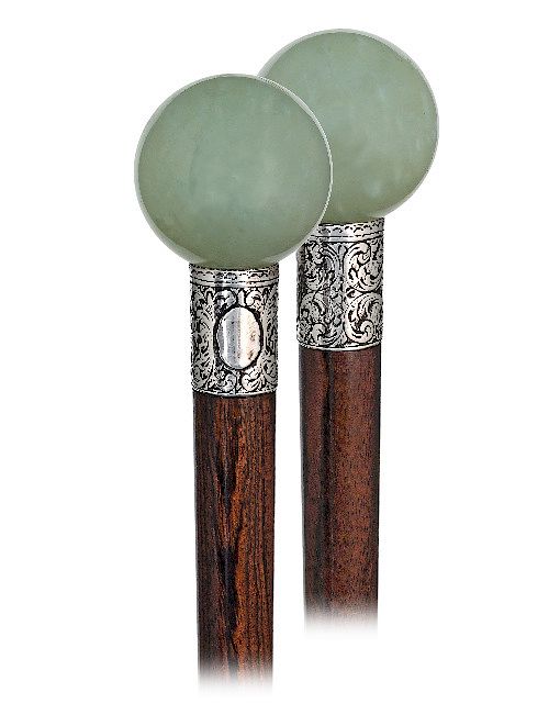 Appraisal: Hard Stone Dress Cane -Ca -A sizeable Siberian jade ball