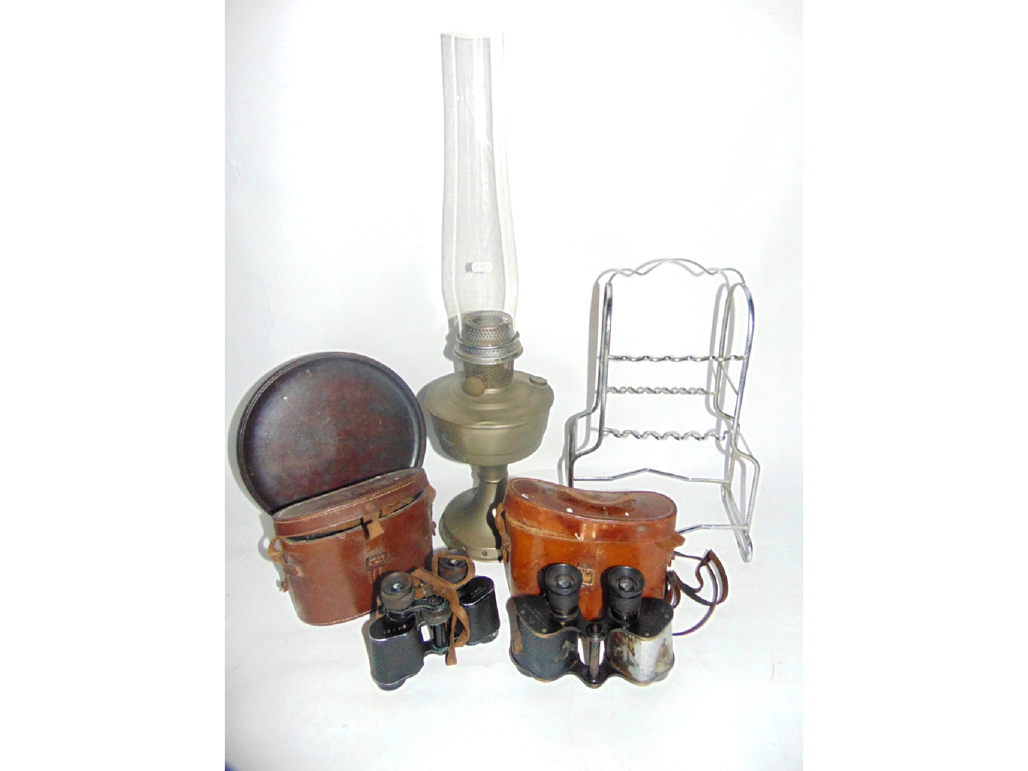 Appraisal: A stainless steel two tiered pipe rack together with an