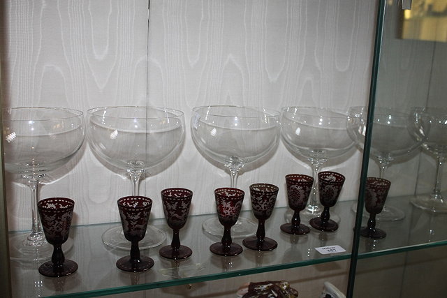 Appraisal: A SET OF SEVEN CONTINENTAL CRANBERRY LIQUEUR GLASSES and a