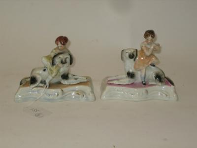 Appraisal: A PAIR OF STAFFORDSHIRE PORCELAIN FIGURES mid th century modelled