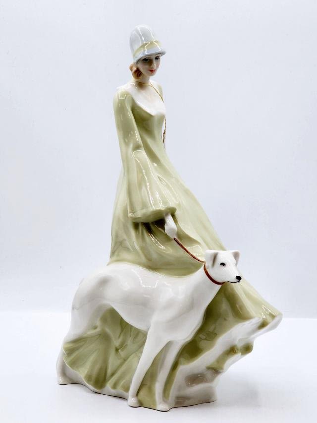 Appraisal: Royal Doulton Reflections Figurine Strolling HN with original box and