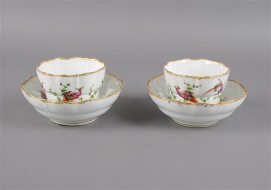 Appraisal: A Pair of English Tea Bowls and Saucers Chelsea Height