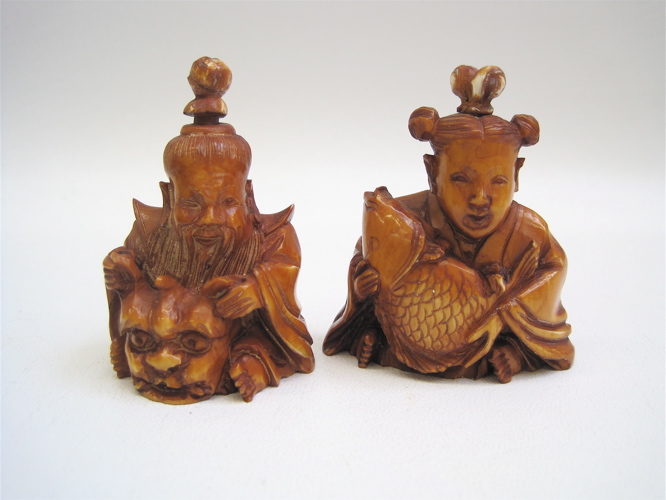 Appraisal: TWO IVORY CARVED FIGURAL SNUFF BOTTLES The first a man