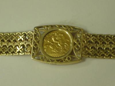 Appraisal: A CT GOLD FLEXIBLE BRACELET set with George V half