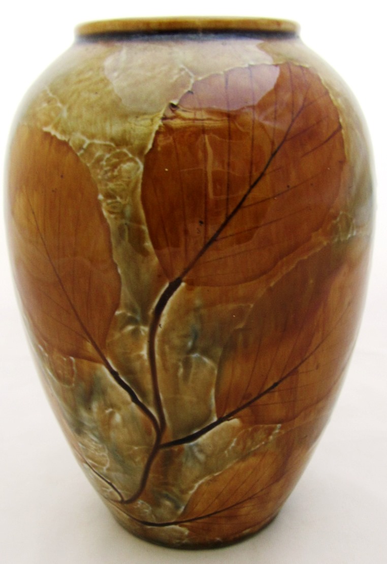 Appraisal: A Royal Doulton saltglaze stoneware vase decorated in the 'Autumn