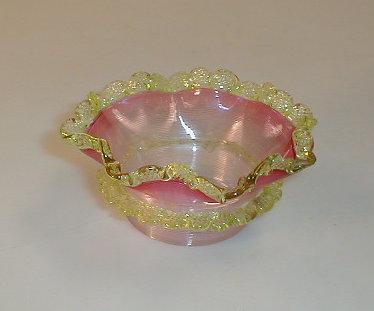 Appraisal: A graded cranberry bowl with applied pale green frills some