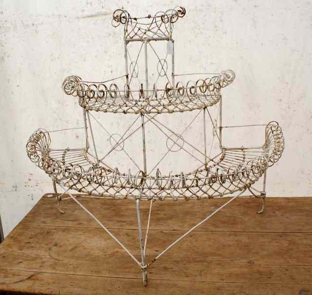 Appraisal: A VICTORIAN WHITE PAINTED WIRE THREE TIER PLANT STAND of