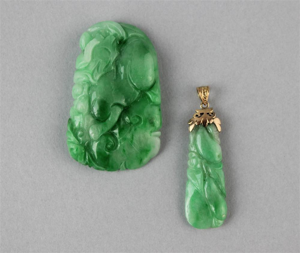 Appraisal: TWO CHINESE CARVED JADEITE PENDANTS the first mounted with a