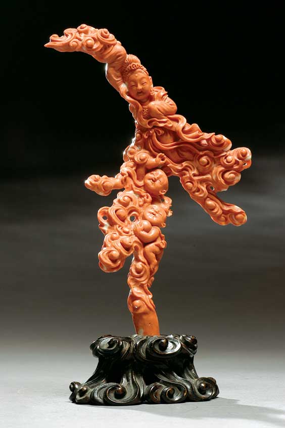 Appraisal: CARVED CORAL DEITY Well carved Chinese coral model of a