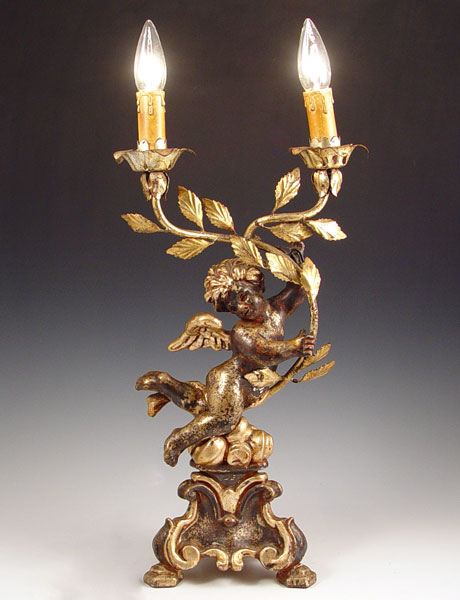 Appraisal: CARVED WOOD PUTTI CHERUB TABLE SCONCE LAMP Electric Measures ''