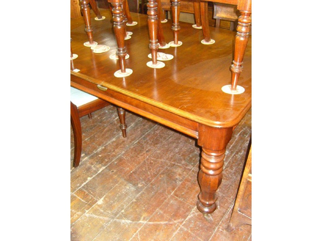 Appraisal: A Victorian mahogany extending dining table of rectangular form fitted