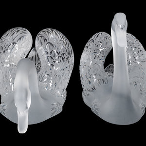 Appraisal: A Pair of Lalique Cygnes Figures th Century Height inches