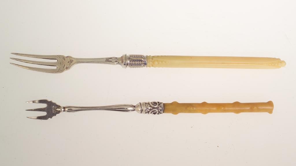 Appraisal: TWO VICTORIAN SILVER AND BONE-HANDLED PICKLE FORKS including Sheffield -