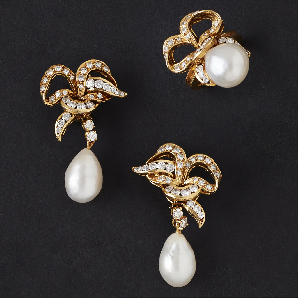 Appraisal: A pair of pearl and diamond set pendant earrings and