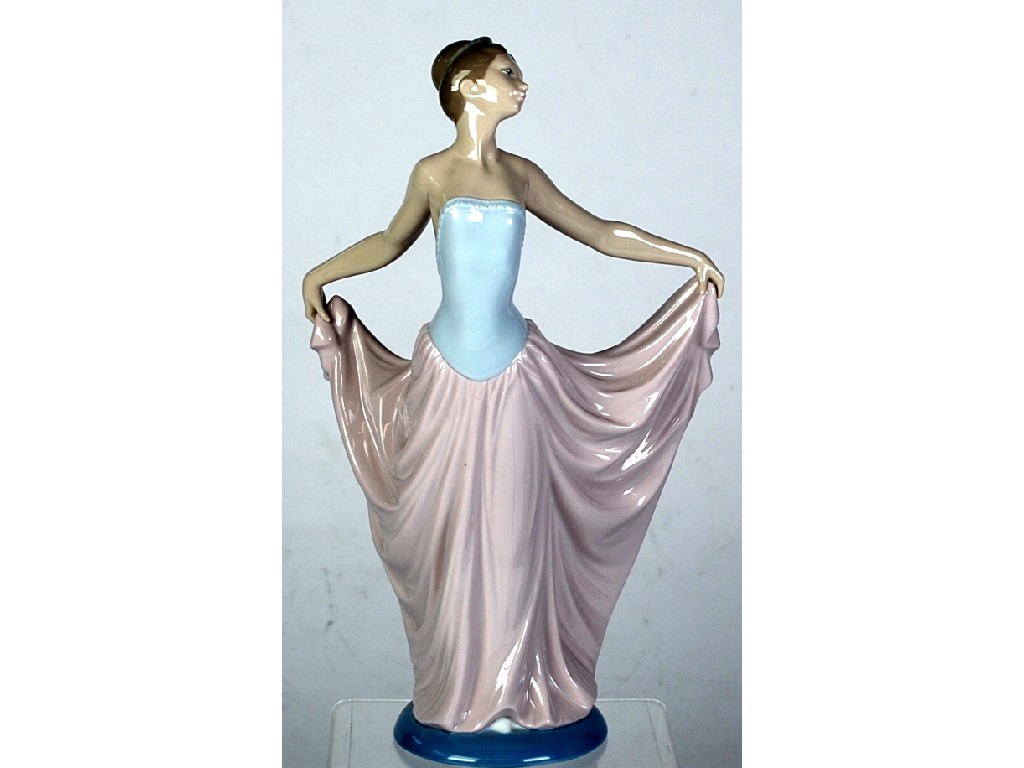 Appraisal: LLADRO SPANISH PORCELAIN FIGURE OF A FEMALE BALLET DANCER holding