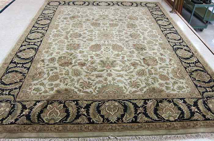 Appraisal: FINE HAND KNOTTED ORIENTAL CARPET Indo-Persian overall foliate design on