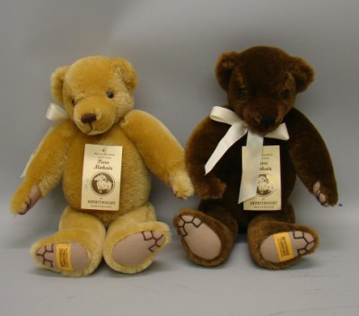 Appraisal: Pair of similar tagged English Merrythought mohair bears Gold has