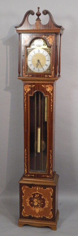 Appraisal: A modern Continental style longcase clock decorated overall with simulated