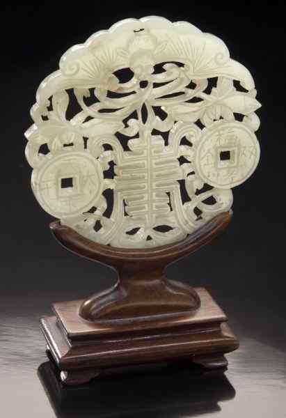 Appraisal: Chinese Qing carved jade plaquedepicting bats and coins '' Dia