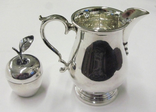 Appraisal: TWO PIECES TIFFANY CO STERLING a cream pitcher Birmingham England