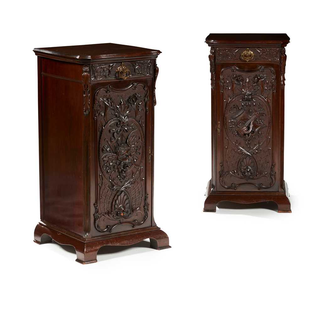 Appraisal: PAIR OF EDWARDIAN CARVED MAHOGANY URN STANDS BY MAPLE CO