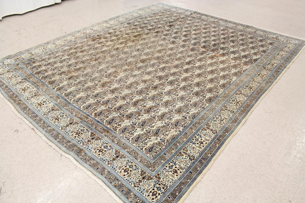 Appraisal: HAND KNOTTED PERSIAN CARPET overall repeating boteh design on cream