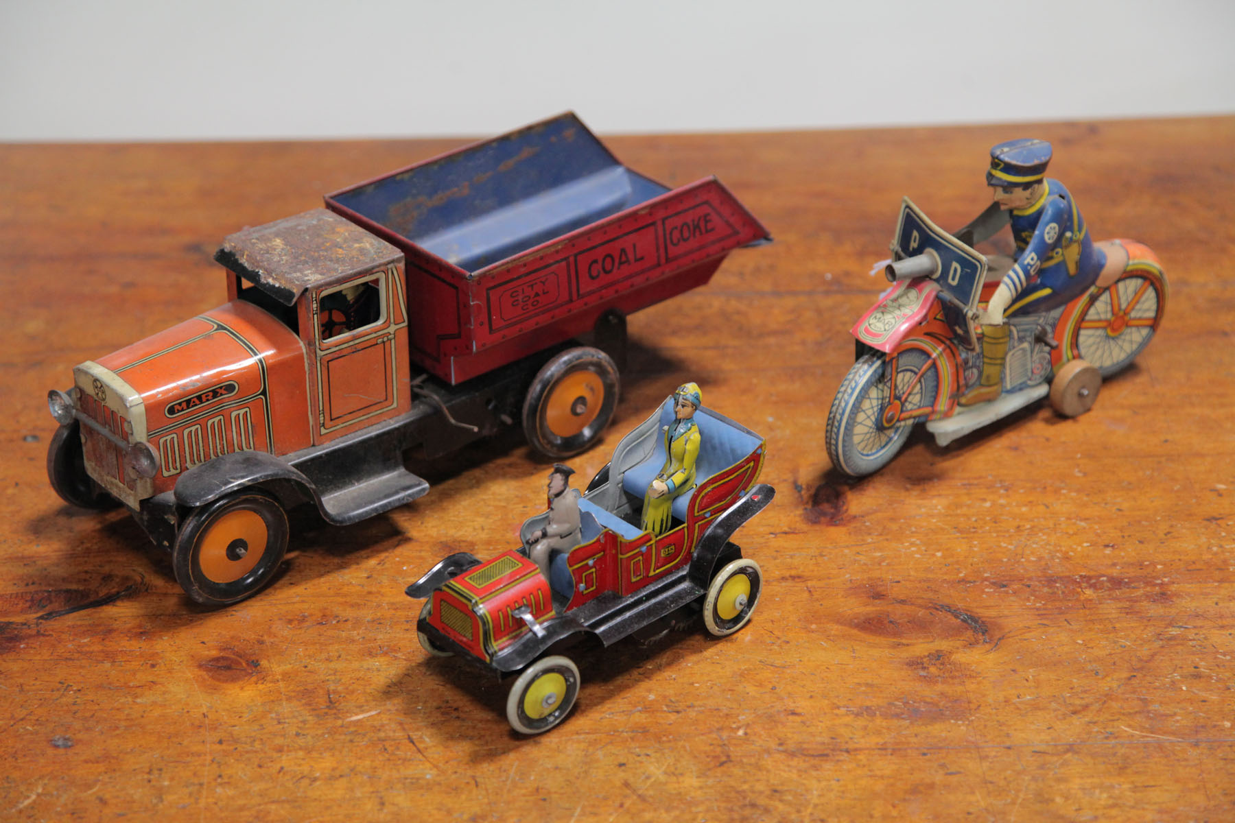 Appraisal: THREE TIN WIND-UP TOYS German and American first half of