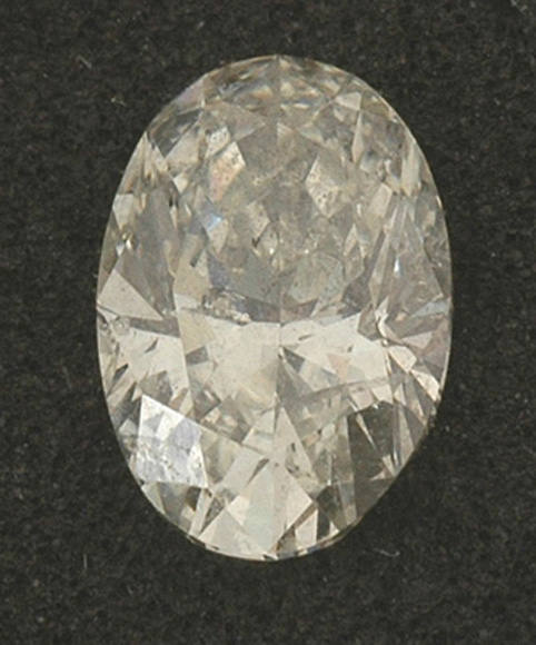 Appraisal: A loose diamond The oval cut diamond weighing cts laser