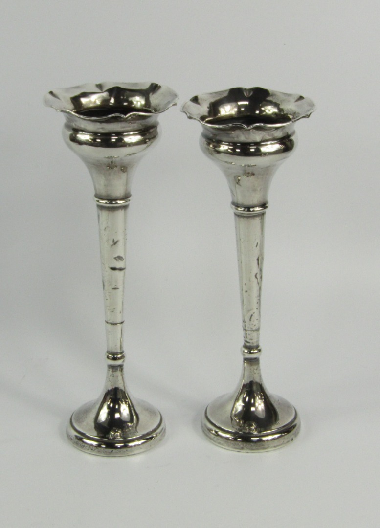 Appraisal: A pair of George V loaded silver bud vases of