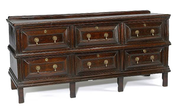 Appraisal: Furniture The rectangular top with molded edge over six drawers