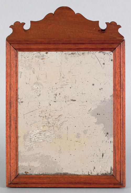 Appraisal: Chippendale mahogany looking glass late th c with a scalloped