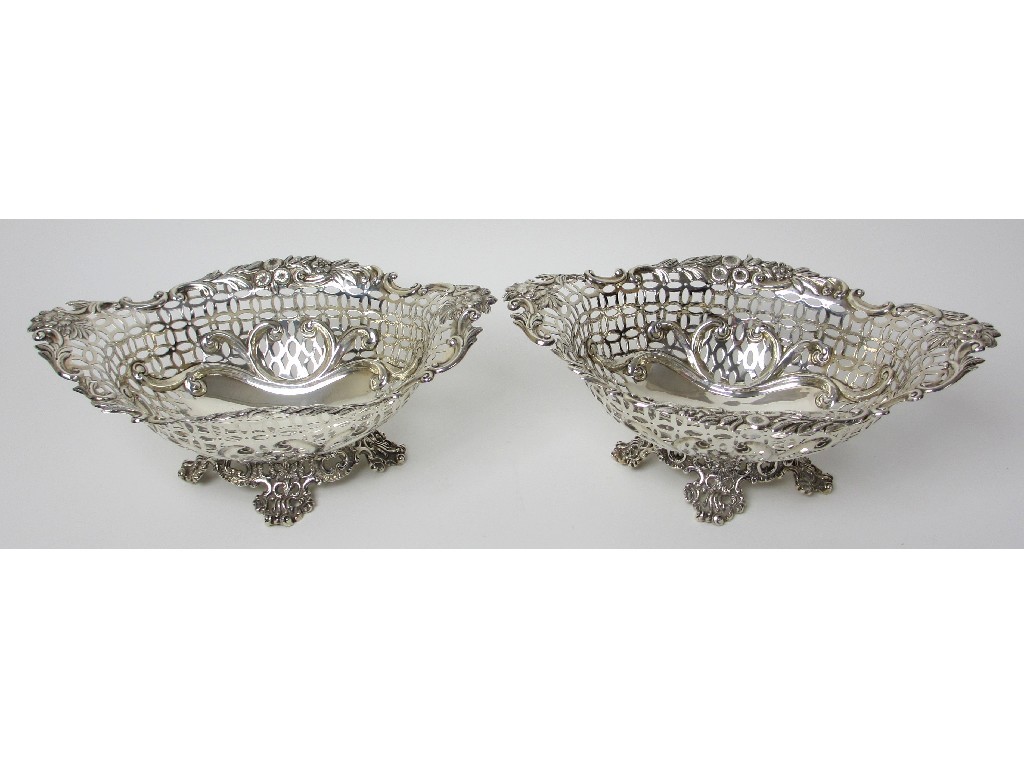 Appraisal: A pair of silver fruit baskets by George Maudsley Jackson