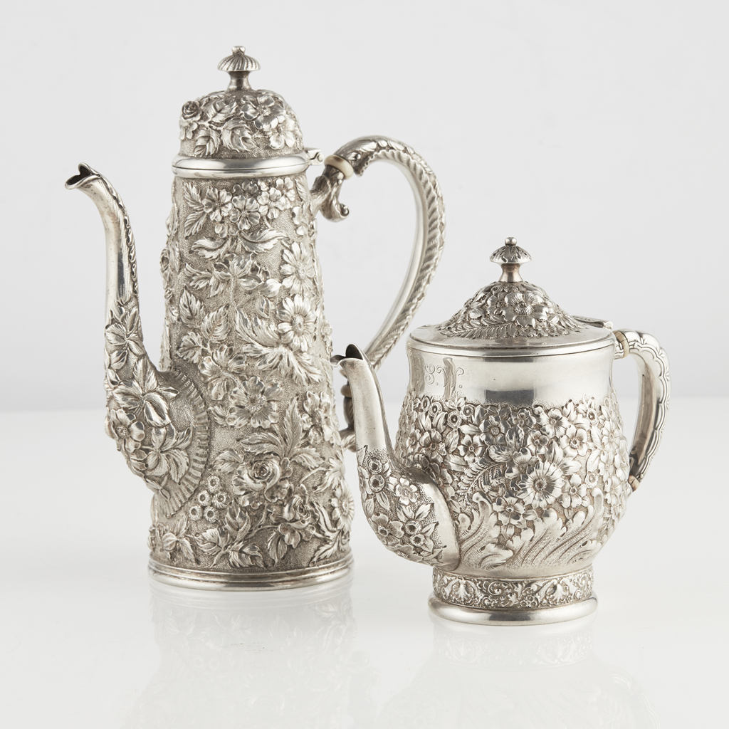 Appraisal: An American coffee pot and Tiffany teapot the small coffee