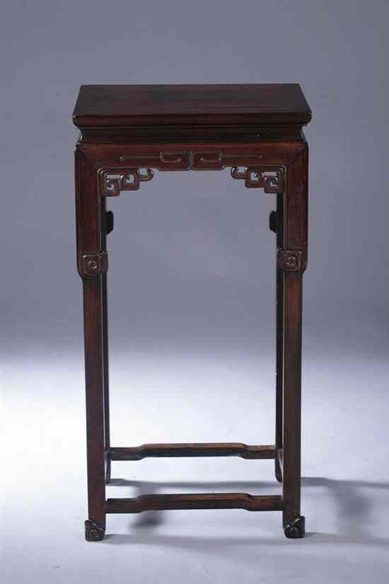 Appraisal: CHINESE ROSEWOOD STAND th century The rectangular top above a